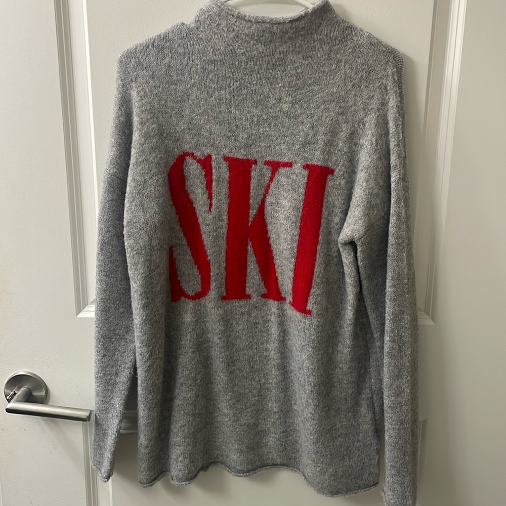 Grey sweater with red lettering size medium.